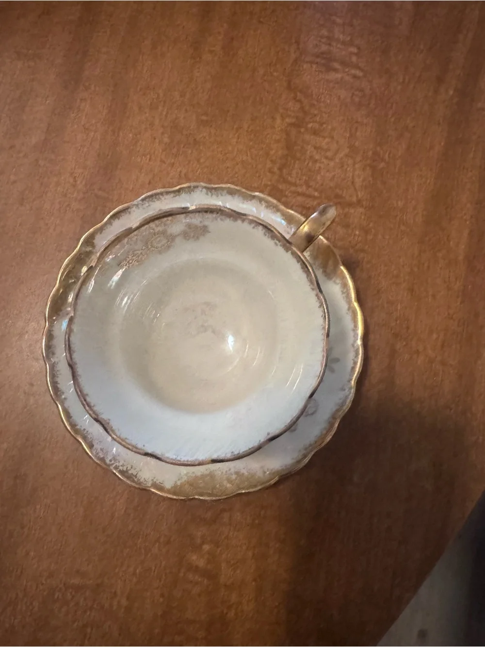 Porcelain Teacup and Saucer Set in White with Gold Trim